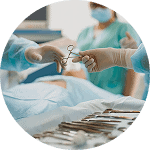 Advanced surgical instruments being used in a hospital operating room.